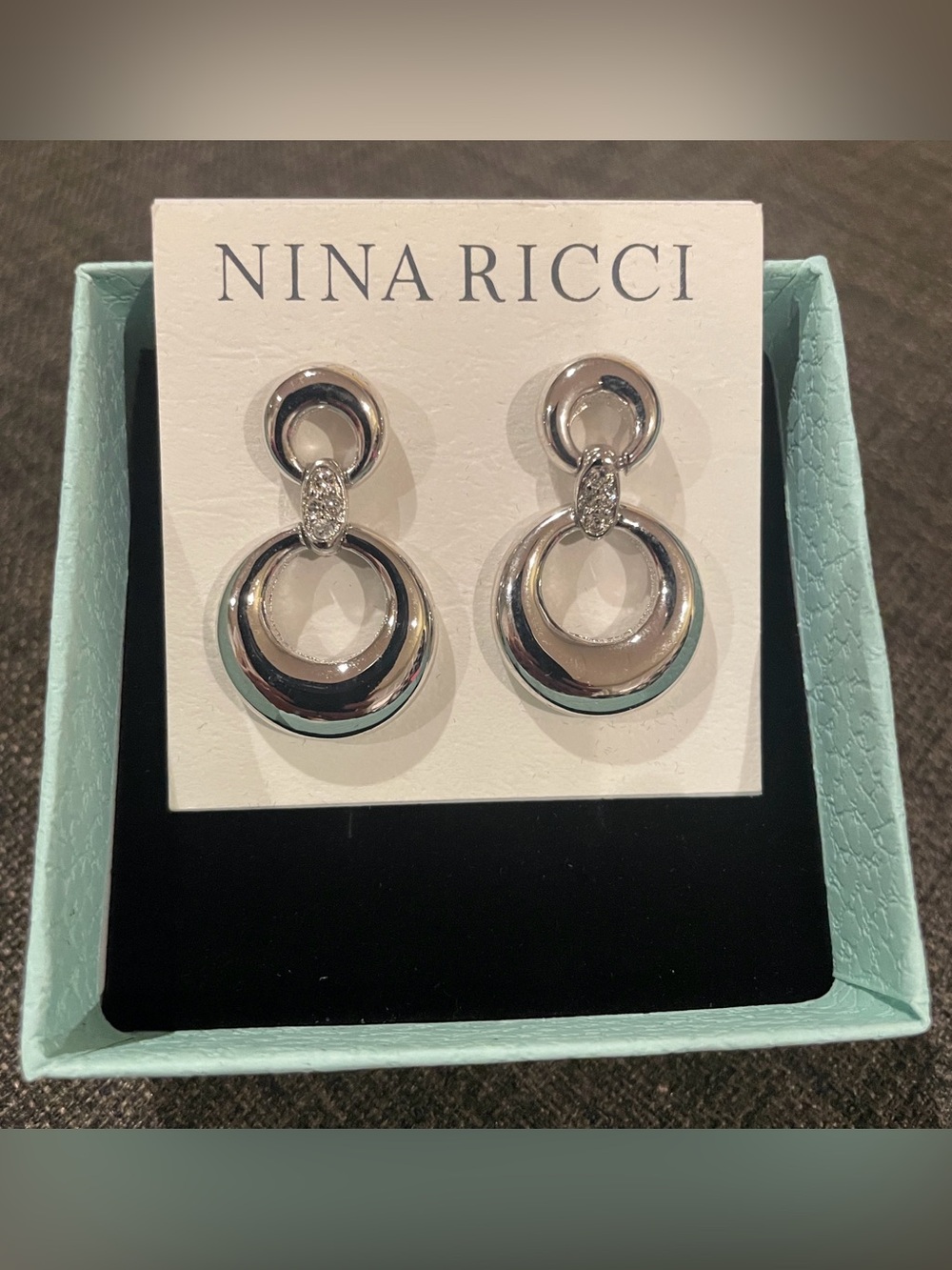 Nina Ricci Polished Silver Loop Drop Earrings. Stunning!!!